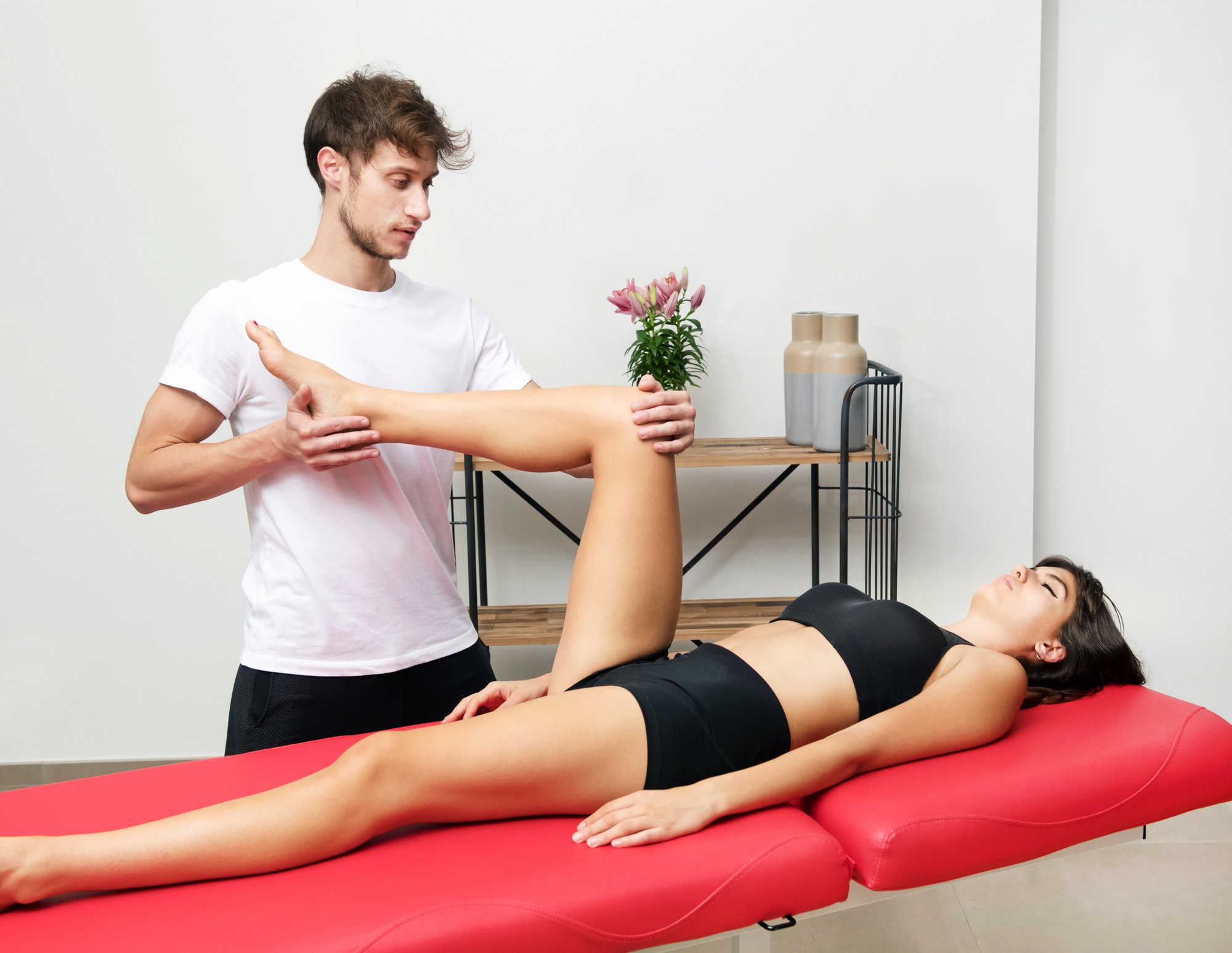 osteopath-doing-a-hip-evaluation-on-a-patient-2025-03-07-19-48-34-utc